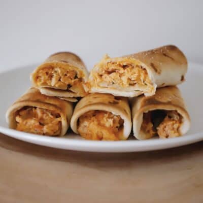 baked chicken taquitos on plate
