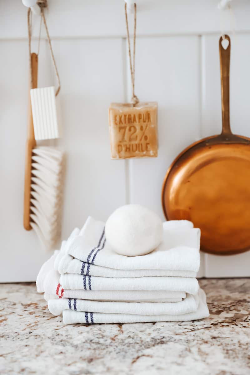 stacked towels and wool dryer balls