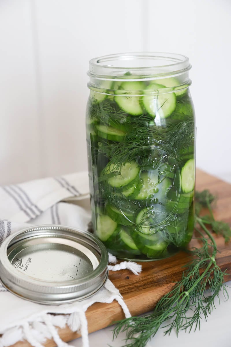 pickled cucumbers in a glass mason jar