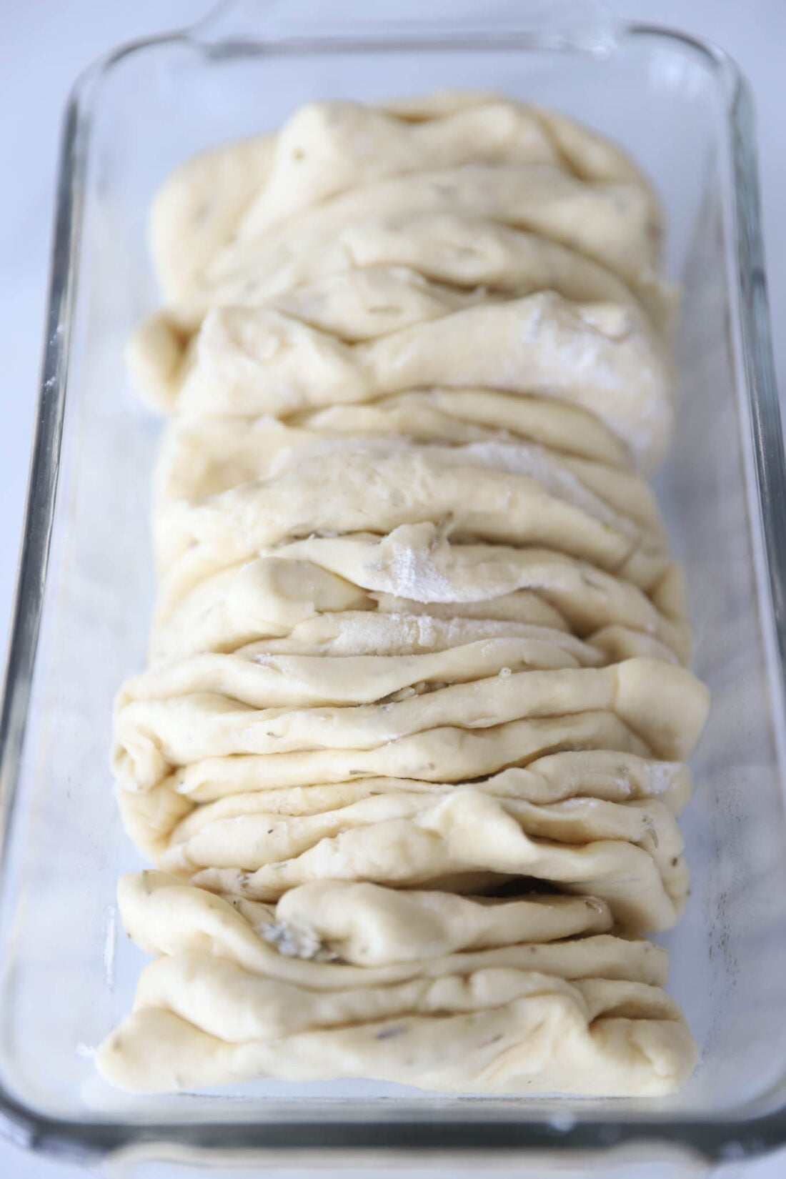 bread dough in a loaf pan