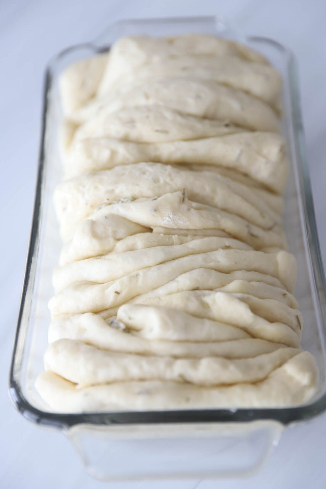 bread dough in a loaf pan