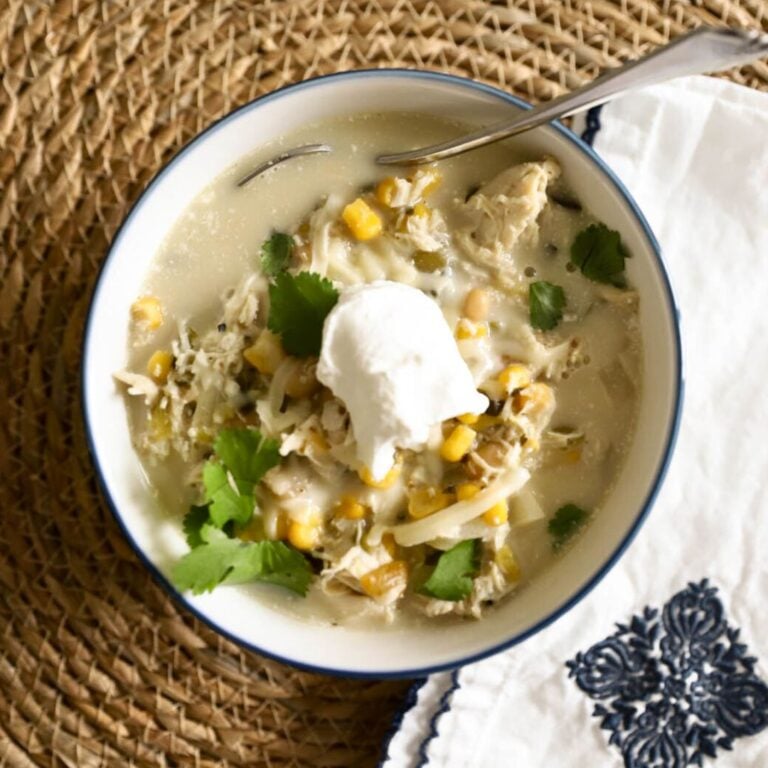 bowl of white chili with sour cream.